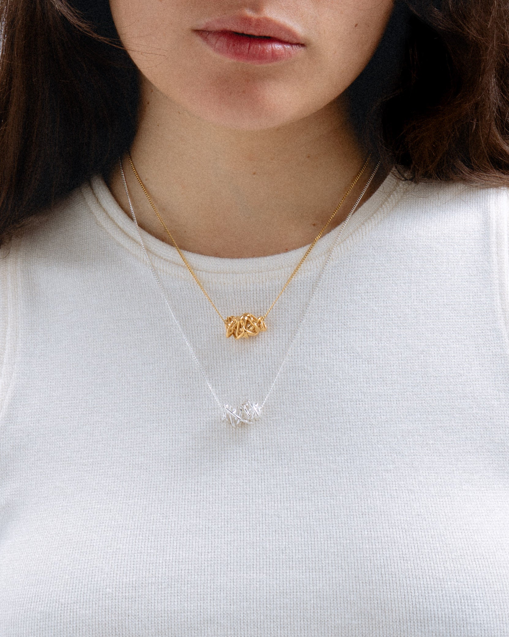 Collares de plata y  dorado Embolic, hecho a mano en València